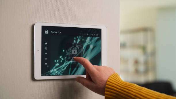 security system in East Perth | Rest-A-Sured Security A close-up video of a senior woman activating an artificial intelligence smart home security system in a smart house before leaving house.